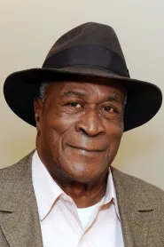 John Amos as Cleo McDowell in Un prinț în America