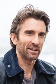 Sharlto Copley as Wikus van de Merwe in District 9