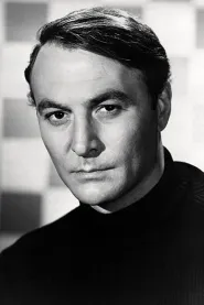 Robert Loggia as MacMillan in Big