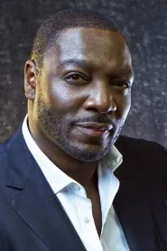 Adewale Akinnuoye-Agbaje as Virgil Brooks in Trumbo